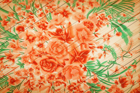 Rose vintage from fabric on white wooden background.の写真素材