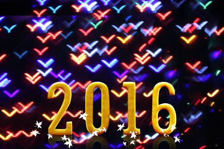 2016 year. on blurred bokeh light.