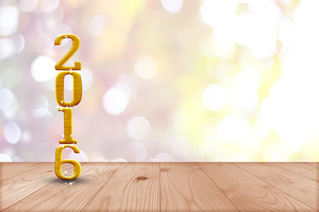 2016 year.  in perspective wood with blur bokeh wall and wooden plank floor