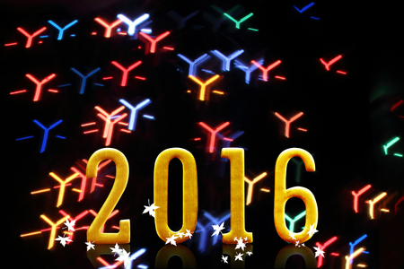 2016 year. on blurred bokeh light.の写真素材