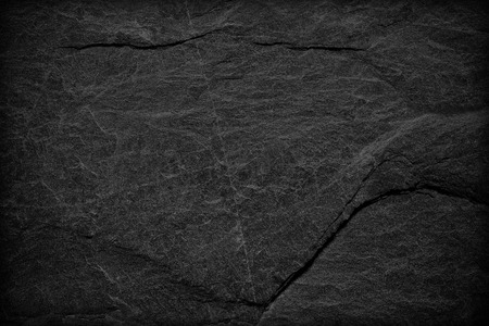 Dark grey black slate background or texture. black stoneの写真素材