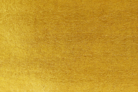 Shiny yellow leaf gold foil texture backgroundの写真素材