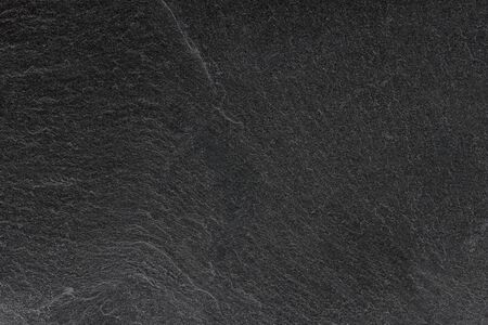 Dark grey black slate background or texture.の写真素材