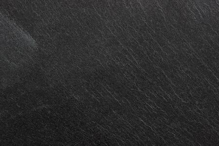 Dark grey black slate background or texture.の写真素材
