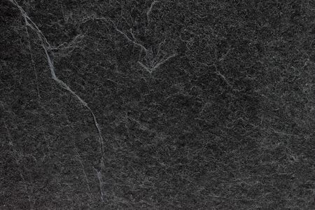 Dark grey black slate background or texture.の写真素材
