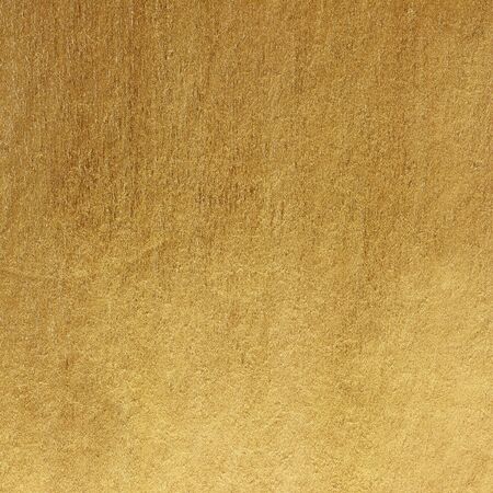 Gold paper texture background. gold wall backgroundの写真素材