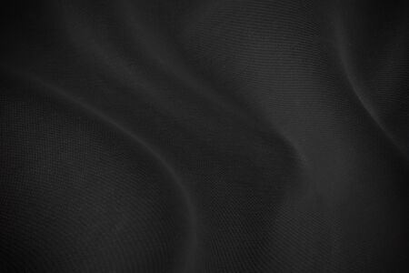 Black fabric sheets background or texture.の写真素材