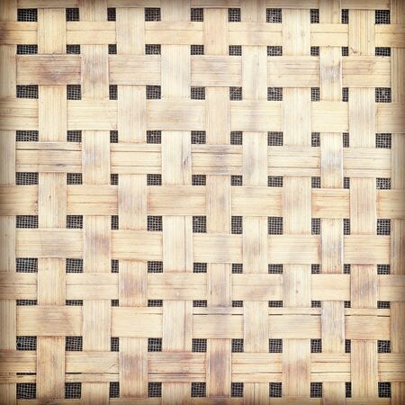 Old and dirty bamboo weave wall vintage retro style background and texture retro style.の写真素材