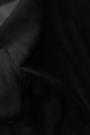 Black fabric sheets background or texture.の写真素材