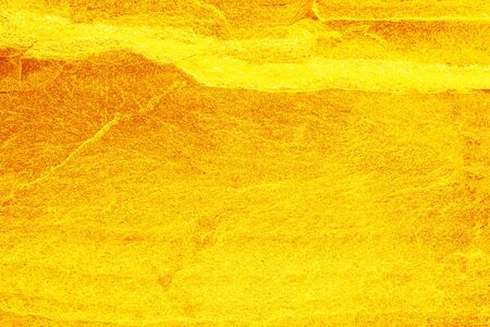 Gold stone texture for background. gold backgroundの写真素材