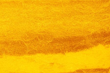 Gold stone texture for background. gold background