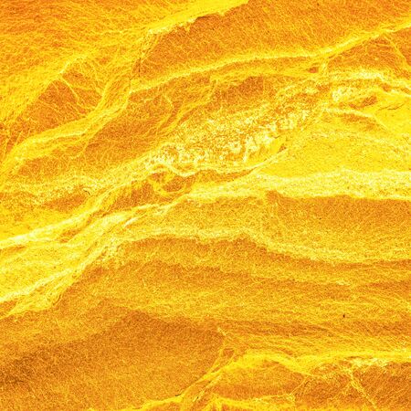 Gold stone texture for background. gold backgroundの写真素材