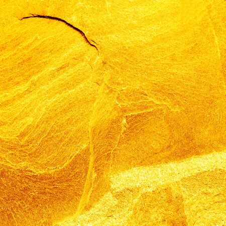 Gold stone texture for background. gold backgroundの写真素材