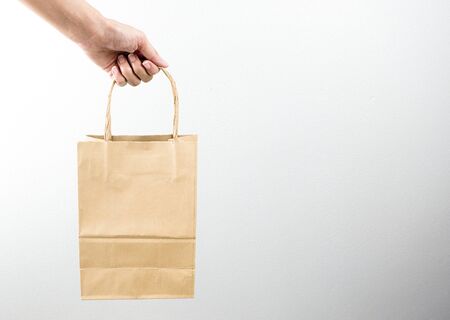 Delivery of food grocery brown bag on the doorstep for protect Corona virus spreading of safety....