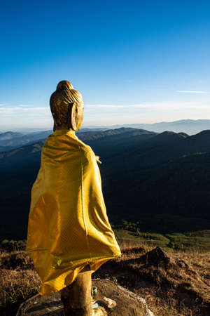 Buddhist statue on the peak of Doi Mon Jong, Chiang Mai, Thailandの写真素材