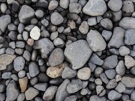 Various size of grey stones. Top view of grey stones floorの写真素材