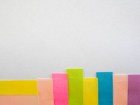 Colorful sticky notes on a white background with free text space