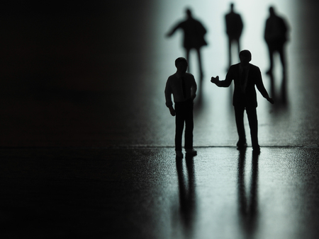 Miniature businessman silhouette, business and technology conceptの写真素材