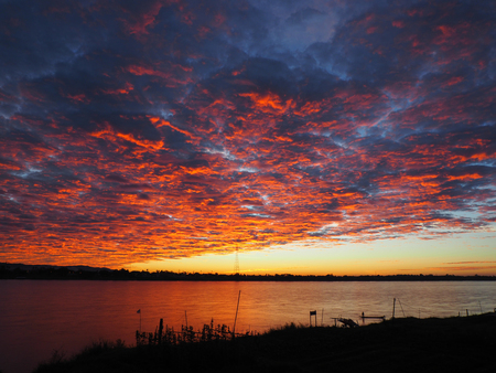 Sunrise and beautiful sky over the river.の写真素材