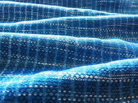 Close-up strip line blue indigo woven fabric pattern texture backgroundの写真素材
