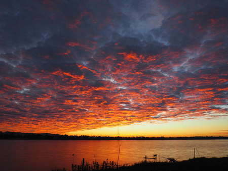 Sunrise and beautiful sky over the river.の写真素材