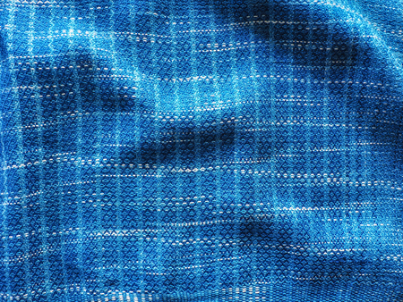 Close-up strip line blue indigo woven fabric pattern texture backgroundの写真素材