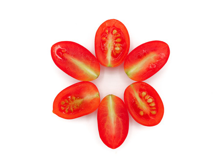 Fresh grape or cherry tomato on white background.の写真素材