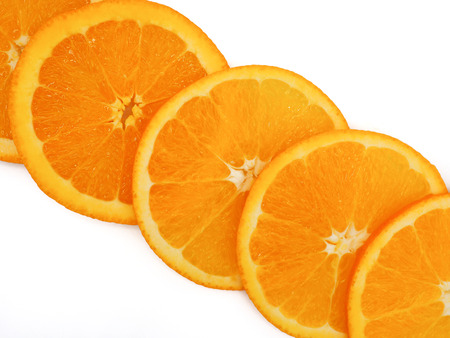 Fresh orange slice on white backgroundの写真素材