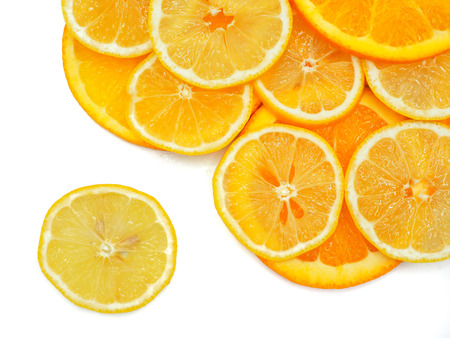 Fresh orange and lemon slice on white background.の写真素材