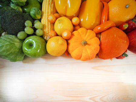 Colorful fresh fruits and vegetables background, healthy eating concept.の写真素材