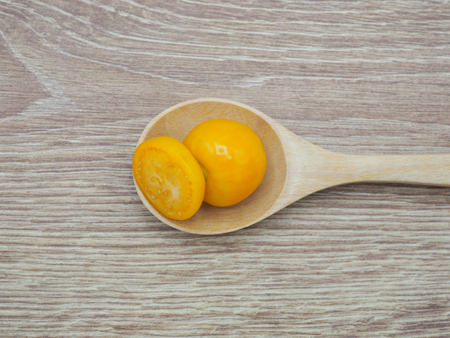 Fresh cape goosebery, physalis, on wooden backgroundの写真素材