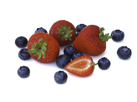 Fresh and sweet strawberry and blueberry on white background, healthy fruit and diet.の写真素材