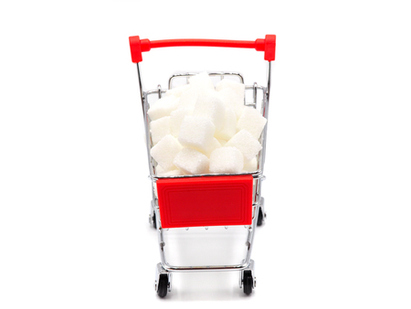 Trolly with sugar on white background. Healthy lifestyle concept.の写真素材