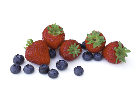 Fresh and sweet strawberry and blueberry on white background, healthy fruit and diet.の写真素材