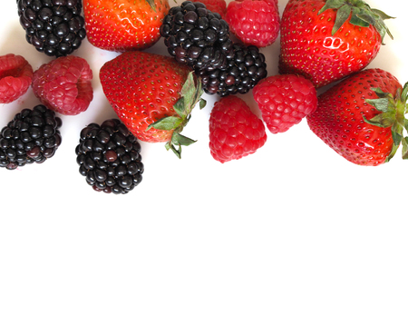 Fresh strawberry, raspberry and blackberry on wooden background, healthy food and diet.の写真素材