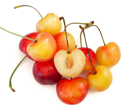 Sweet and healthy Rainier cherries on white background, fresh fruitsの写真素材