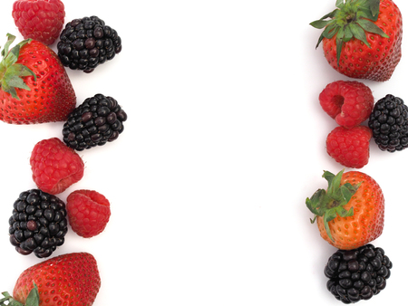 Fresh strawberry, raspberry and blackberry on wooden background, healthy food and diet.の写真素材