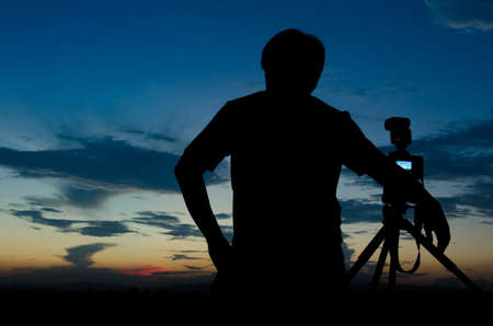 a man waiting in silhouette の写真素材