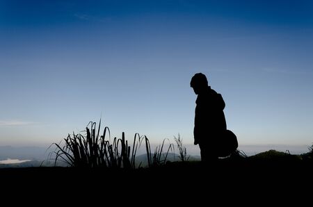 the man standing with silhouette backgroundの写真素材