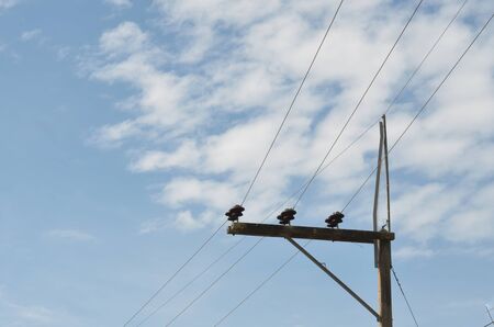electric pole with blue sky