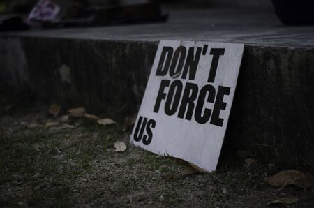 white label wood with word DON'T FORCE USの写真素材