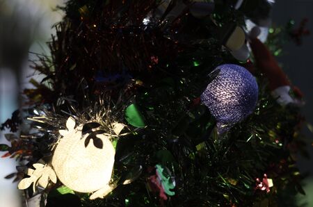 colorful beauty cotton light lamp on christmas tree and happy new year celebration,soft focusの写真素材