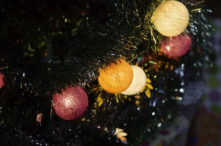 colorful beauty cotton light lamp on christmas tree and happy new year celebration,soft focusの写真素材
