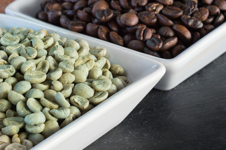 raw and roasted coffee beansの写真素材