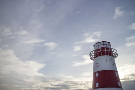 red and white light houseの写真素材