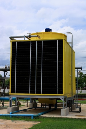 Yellow cooling tower in plantの写真素材