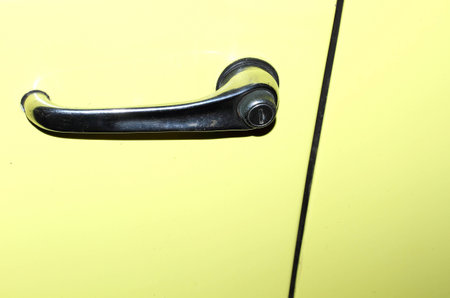  Abstract photo of car door handle and lockの写真素材