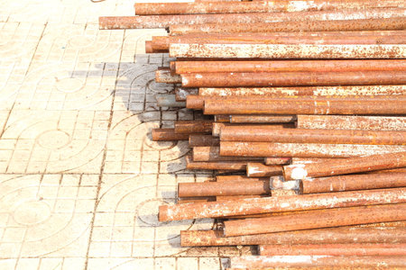 Metal pipe stack on shelfの写真素材