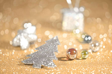 Christmas bokeh donut illuminated background and giftの写真素材