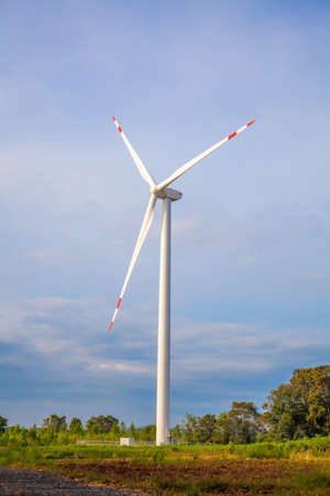 Wind turbines, blue sky and cloudの写真素材
